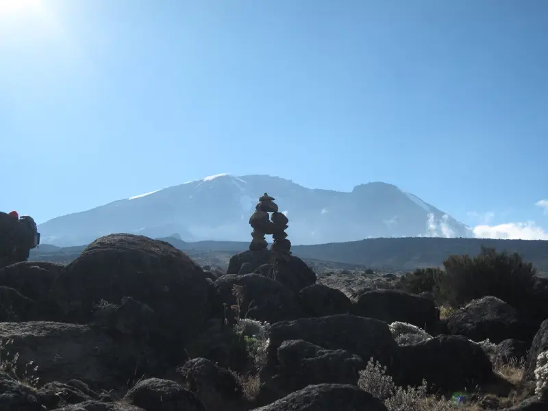 Stone cairns on the Shira Plateau with Kibo behind